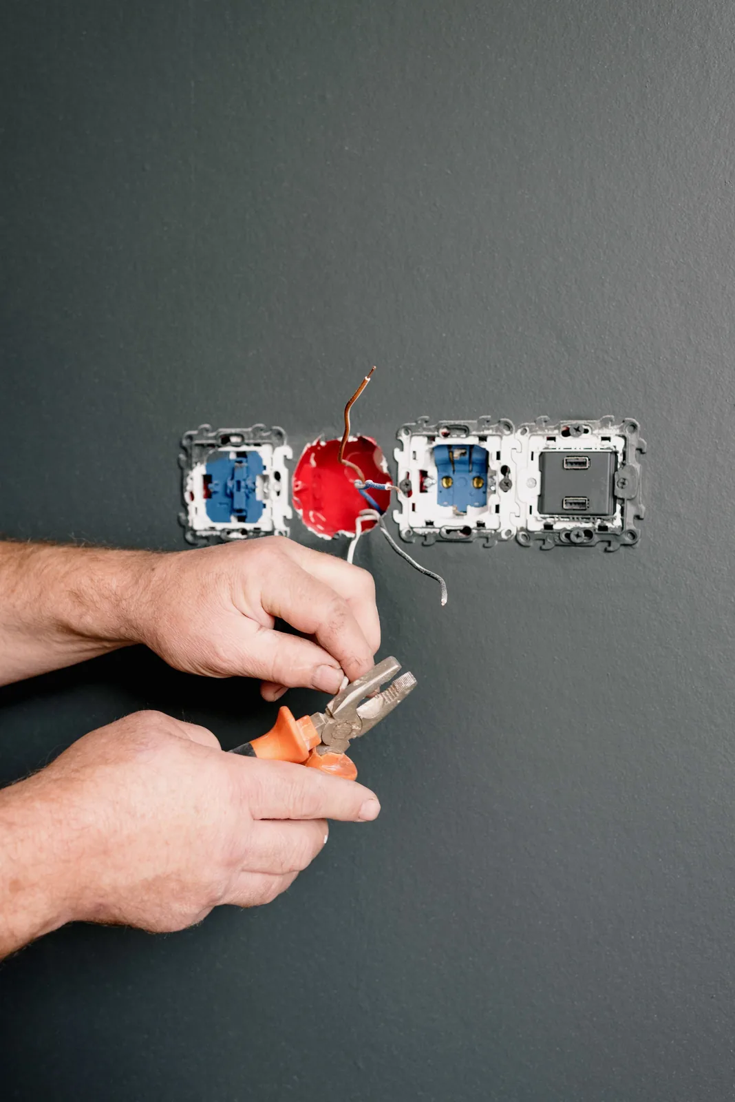 Wiring an outlet box into a finished wall, for code violation in Salt Lake City