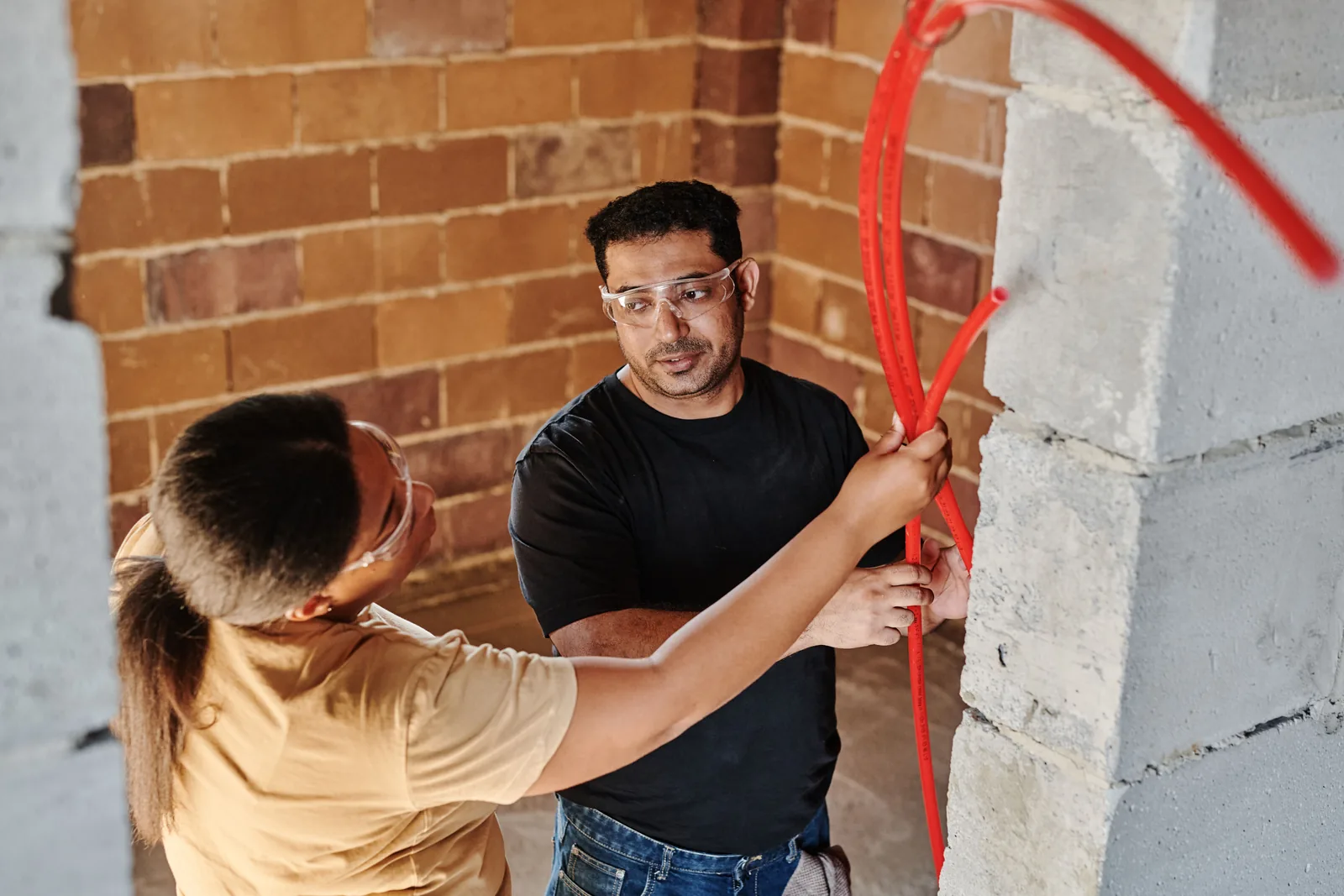 Running conduit across a block wall, for electrician in Sandy